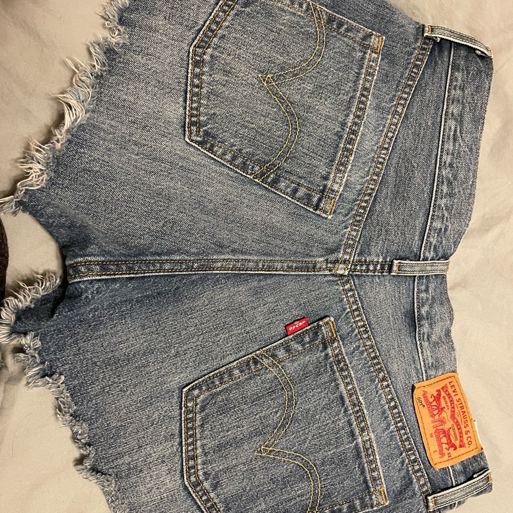 Perfectly fringed cut off 501 Jean shorts